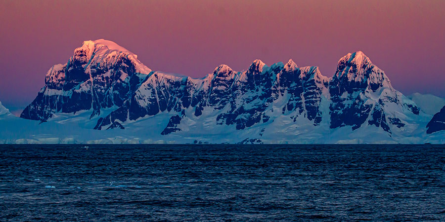iceburgs with pink sky