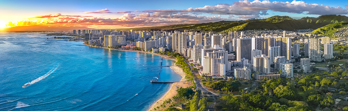 Landscape view of ocean, beach, and city