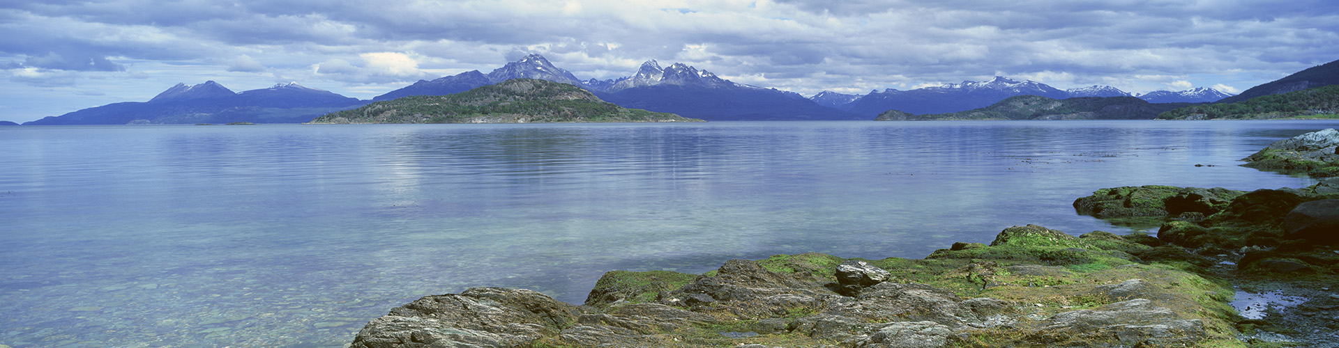 Landscape view of lake with mountains in background