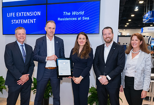 Representatives from the world accepting a certificate