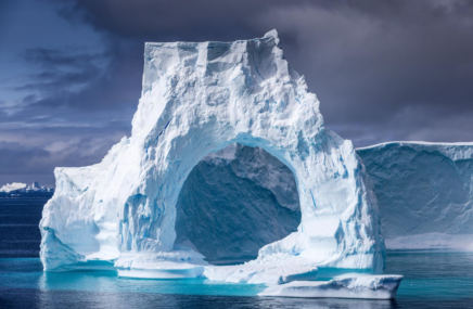 Uniquely shaped iceburg with a circle in the middle