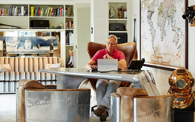 man at desk working in office